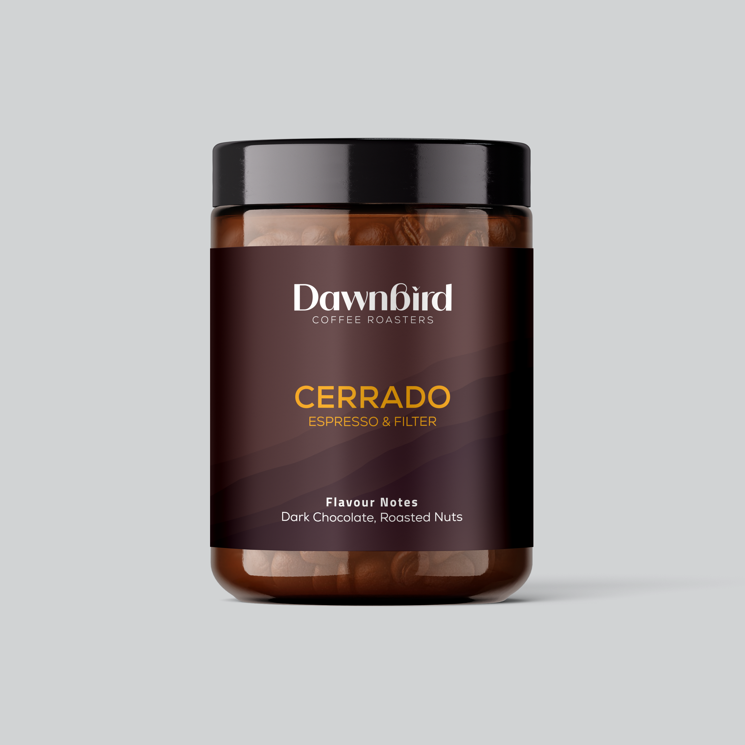 Jar of Dawnbird Coffee Roasters Cerrado coffee on a gray background